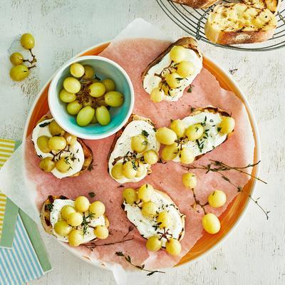 crostini with fetas spread and toasted grapes
