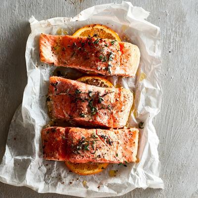 fish packages with orange and thyme