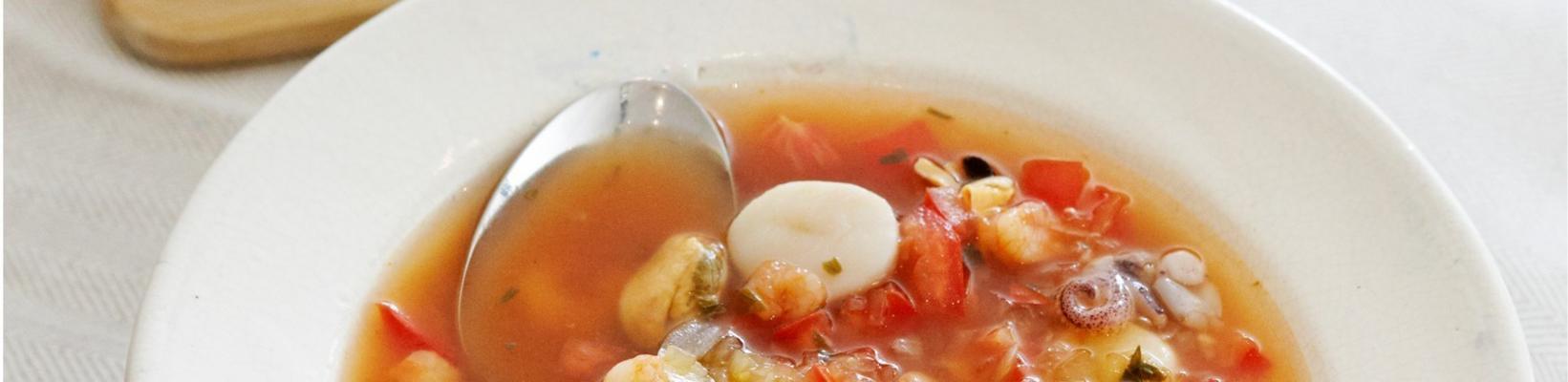 bright fish soup with tomato and tarragon