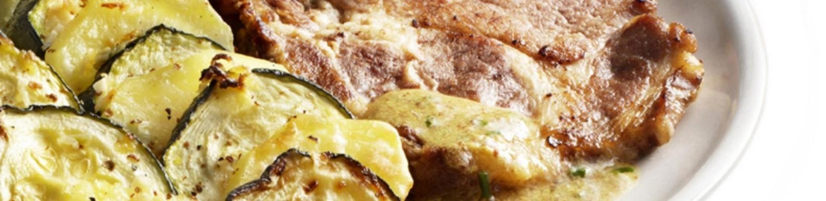shoulder chop with zucchini gratin and herb mustard