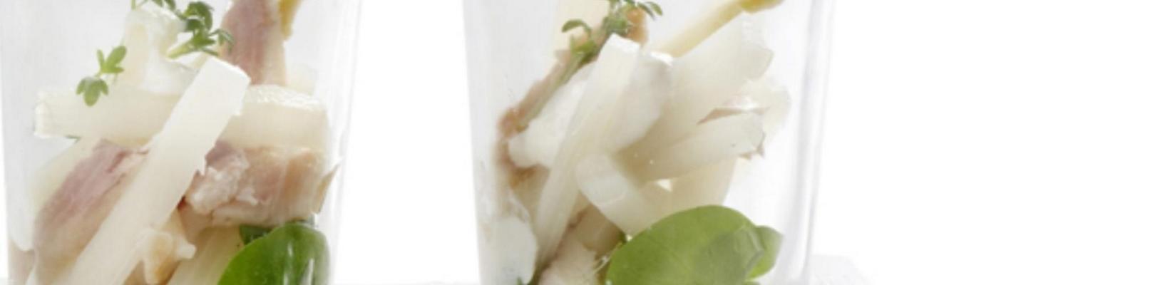 appetizer of white asparagus with smoked trout