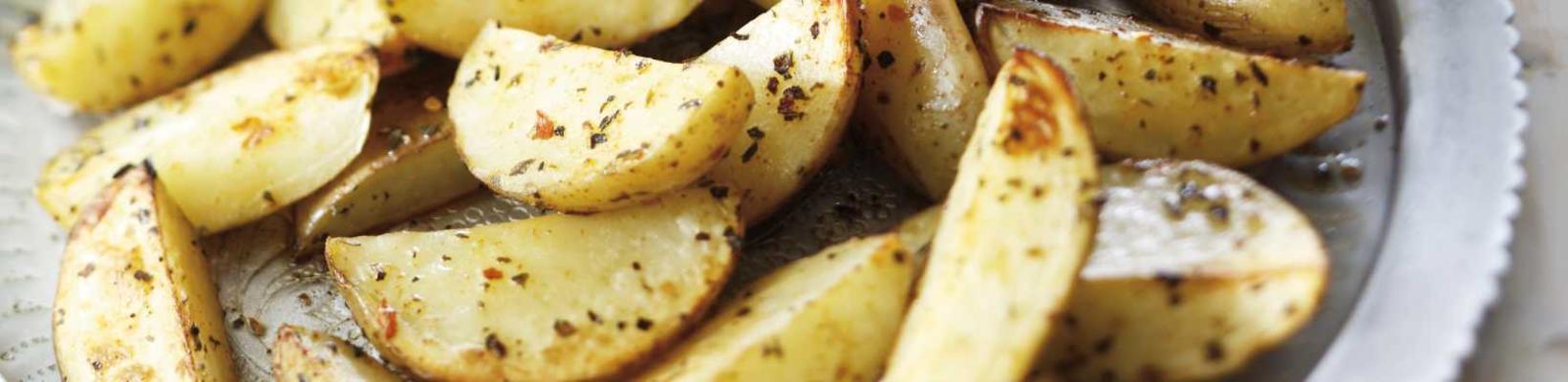 fast oven potatoes in the shell with oregano and chili