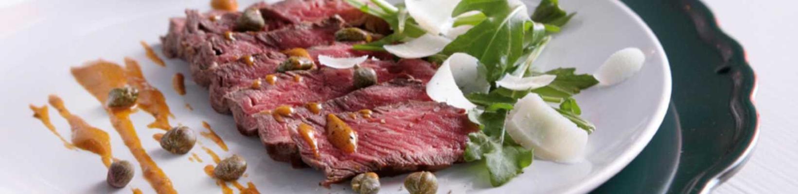 thinly sliced ​​steak with capers