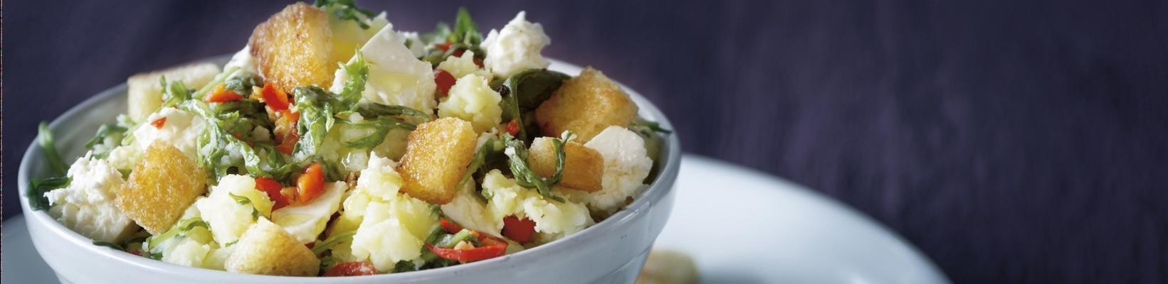 rucola stew with feta and herb croutons