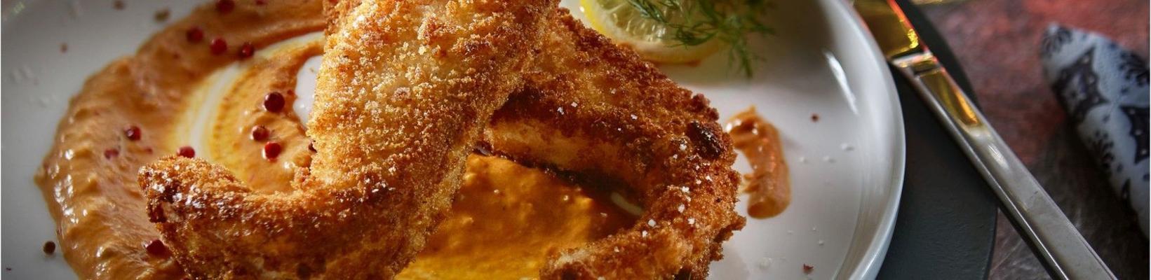 breaded salmon with pepper sauce