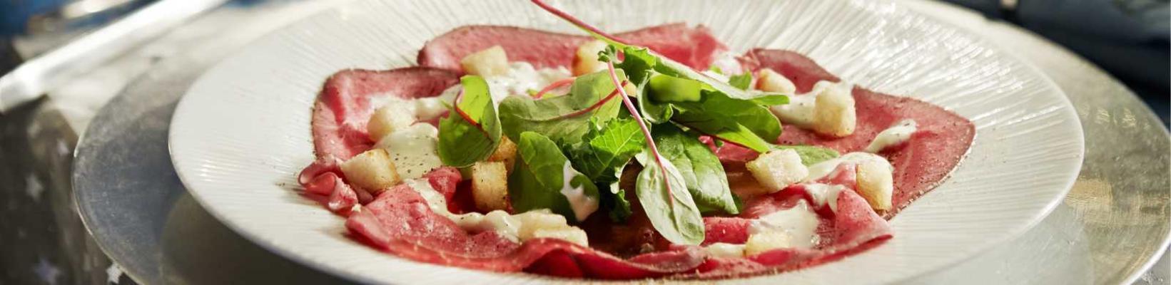 carpaccio of roast beef with blue cheese