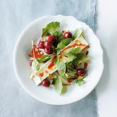 salad with warm brie, cherries and cinnamon dressing