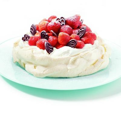 pavlova with forest fruits and Christmas chocolates