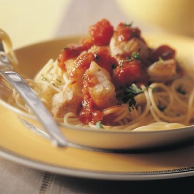 spaghetti with cod in tomato sauce