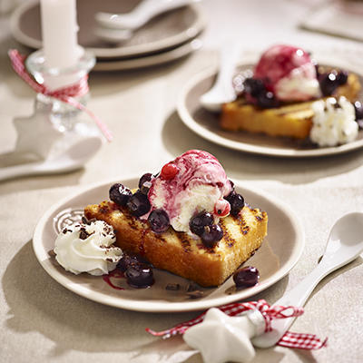 roasted cake with red fruit ice and blueberries