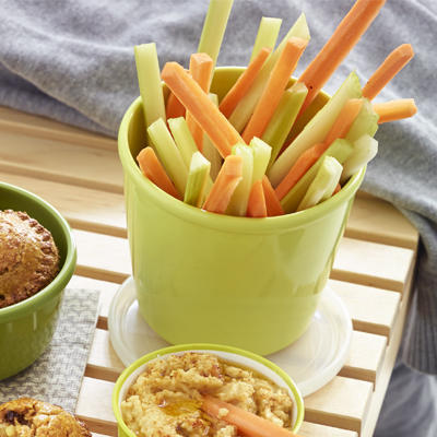 carrot strips and celery sticks with homemade humus