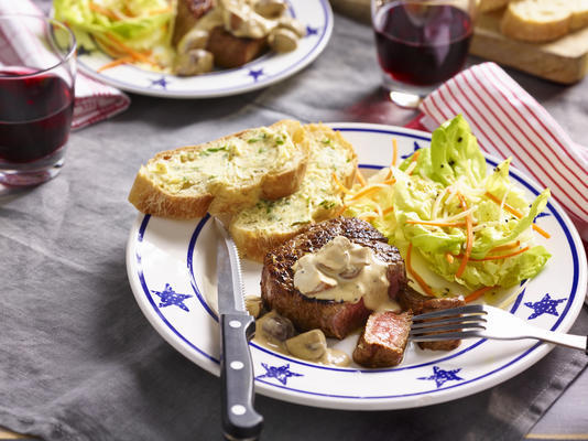 bistro steak with mushroom sauce and Italian lettuce