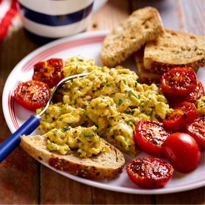 scrambled eggs with herbs and french toast - herbs with roasted bread