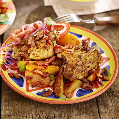 tex mex chicken with bacon potatoes and red salad