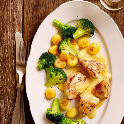 chicken fillet with mustard sauce and broccoli