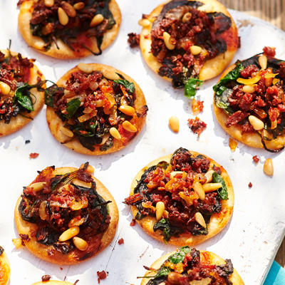 Spanish pizzas with spinach and chorizo