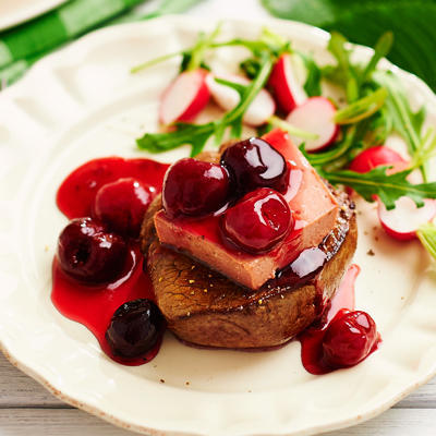 steak with pate and sweet-sour cherries