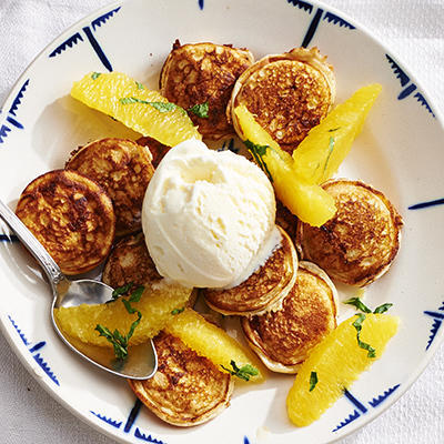 bulb tubes - poffertjes with orange compote and ice cream