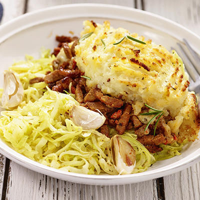 shepherd's pie with creamy cabbage and puffed garlic