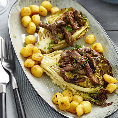 grilled lettuce heads with steak strips