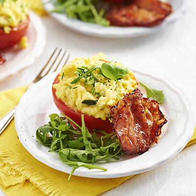 tomato stuffed with scrambled eggs and crispy bacon