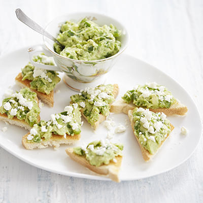 avocados spread with green pepper
