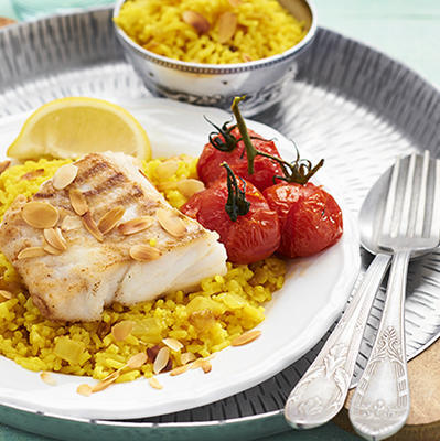 fried cod on yellow curry rice