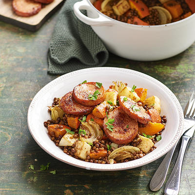 lentil stew with pumpkin, parsnip and grill sausage