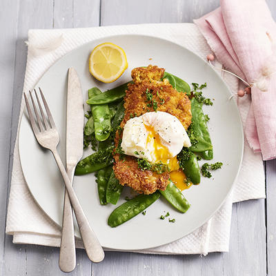 breaded chicken schnitzels with poached egg