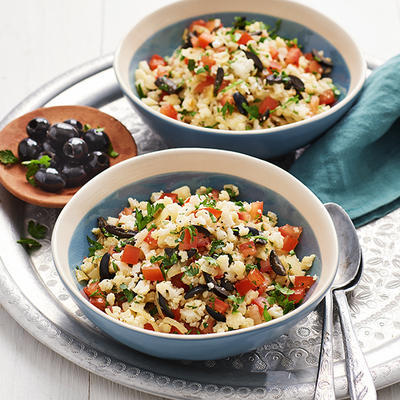 cauliflower couscous with tomato and olives