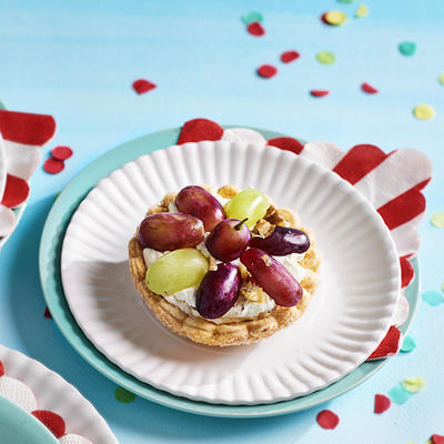 nut tarts with grapes