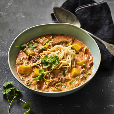 spicy thai beef soup with noodles