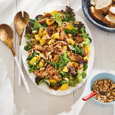 summer salad with chicken, mango and peanut dressing