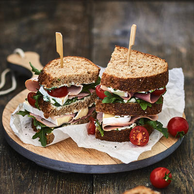 wholemeal club sandwich with ham and brie