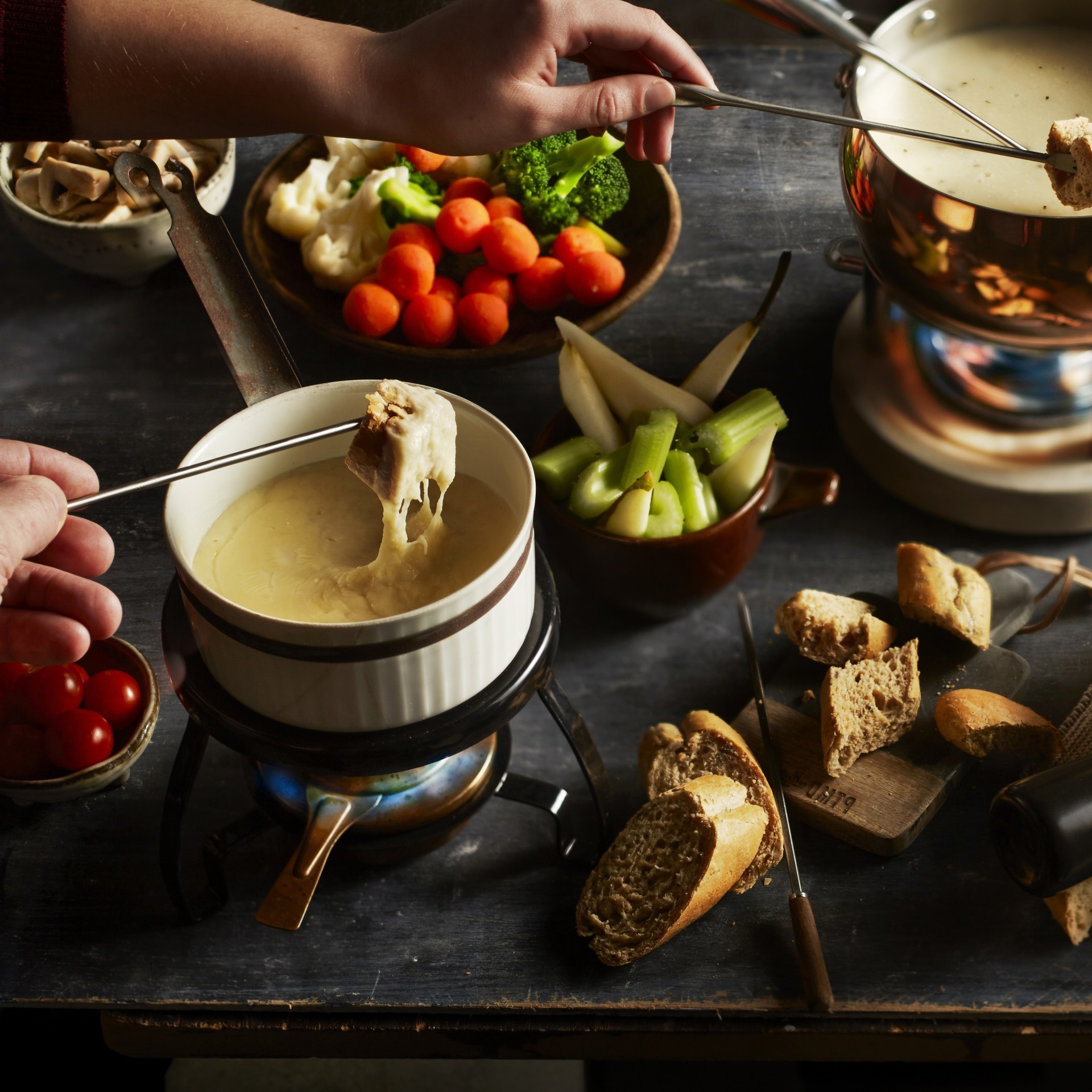 Cheese fondue on his swiss Cheese fondue on his swiss