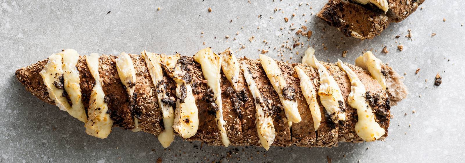 Hasselback stick bread with camembert and truffle Hasselback stick bread with camembert and truffle